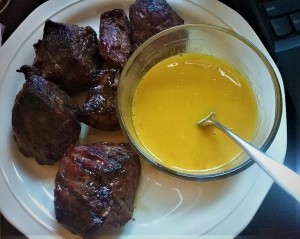 steak tips and egg yolk sauce